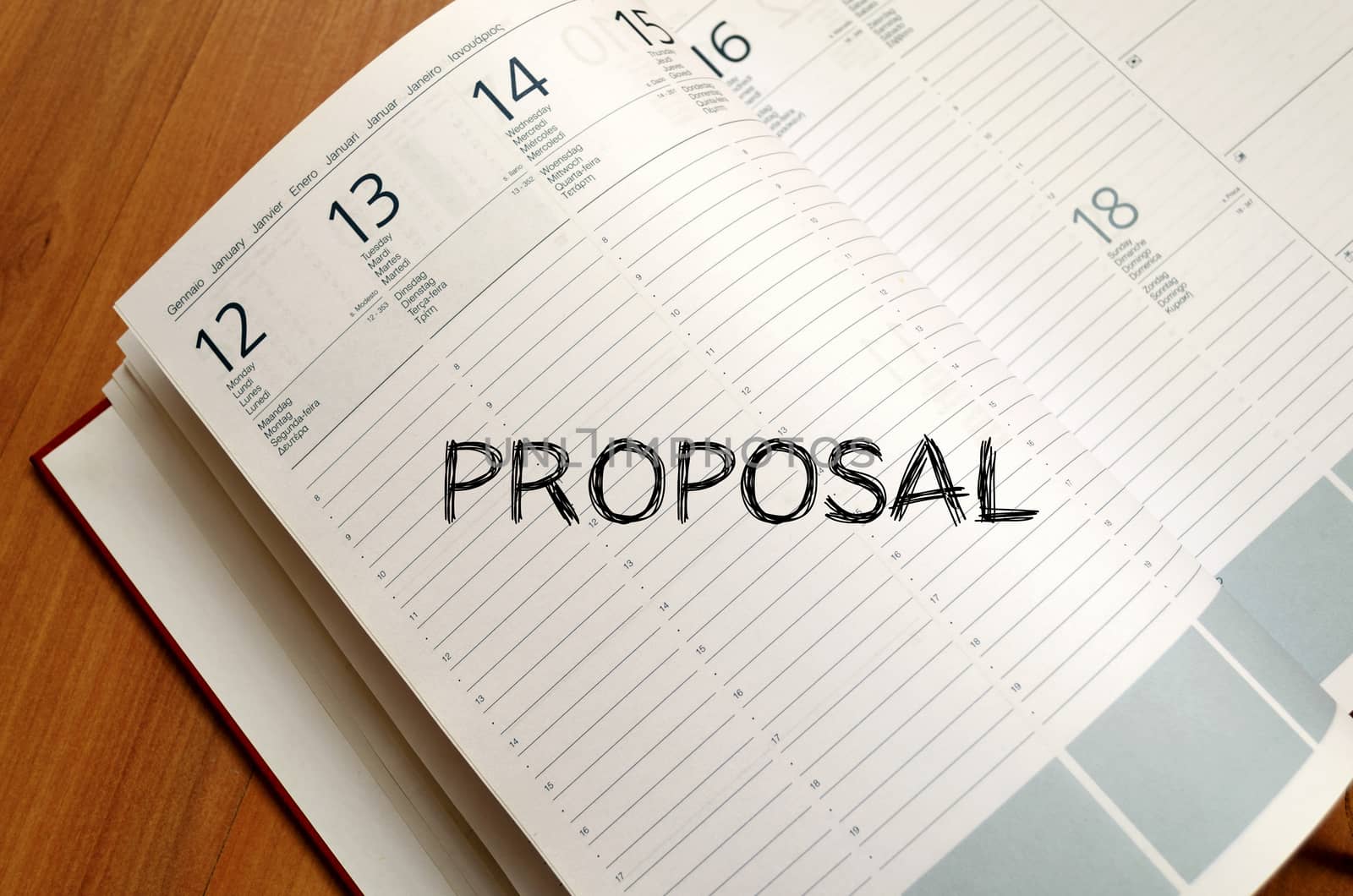 Proposal text concept write on notebook with pen