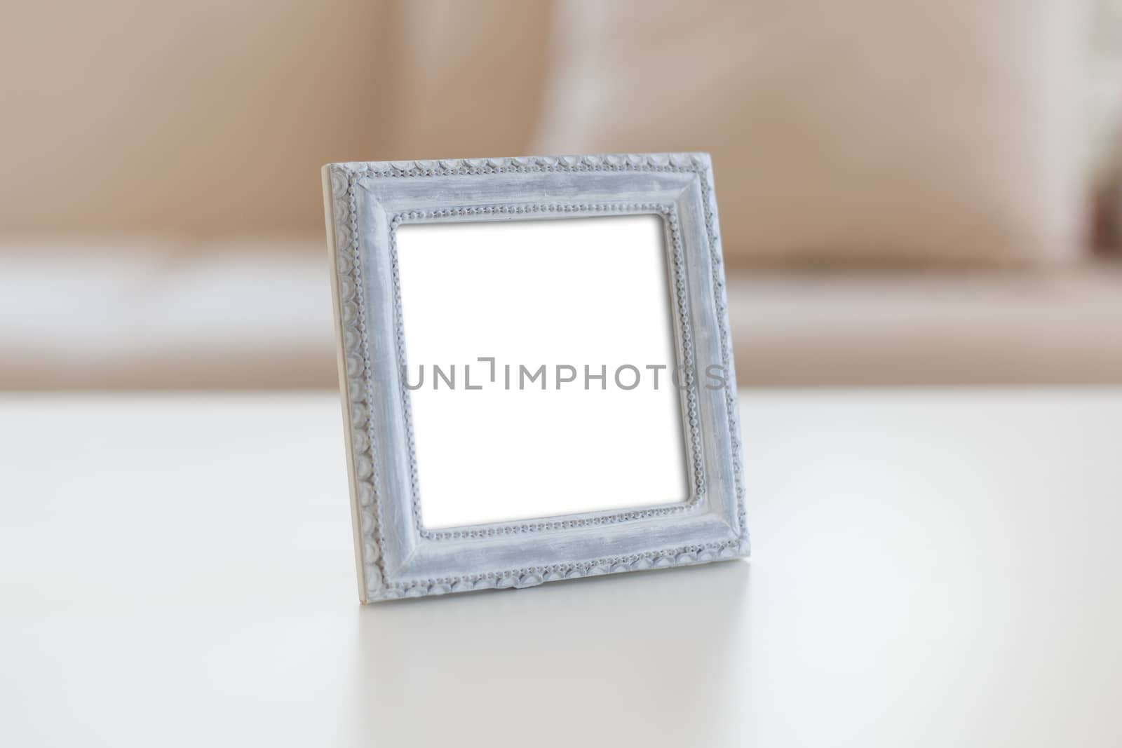 Close up detailed front view of white blank wooden frame with copy space.