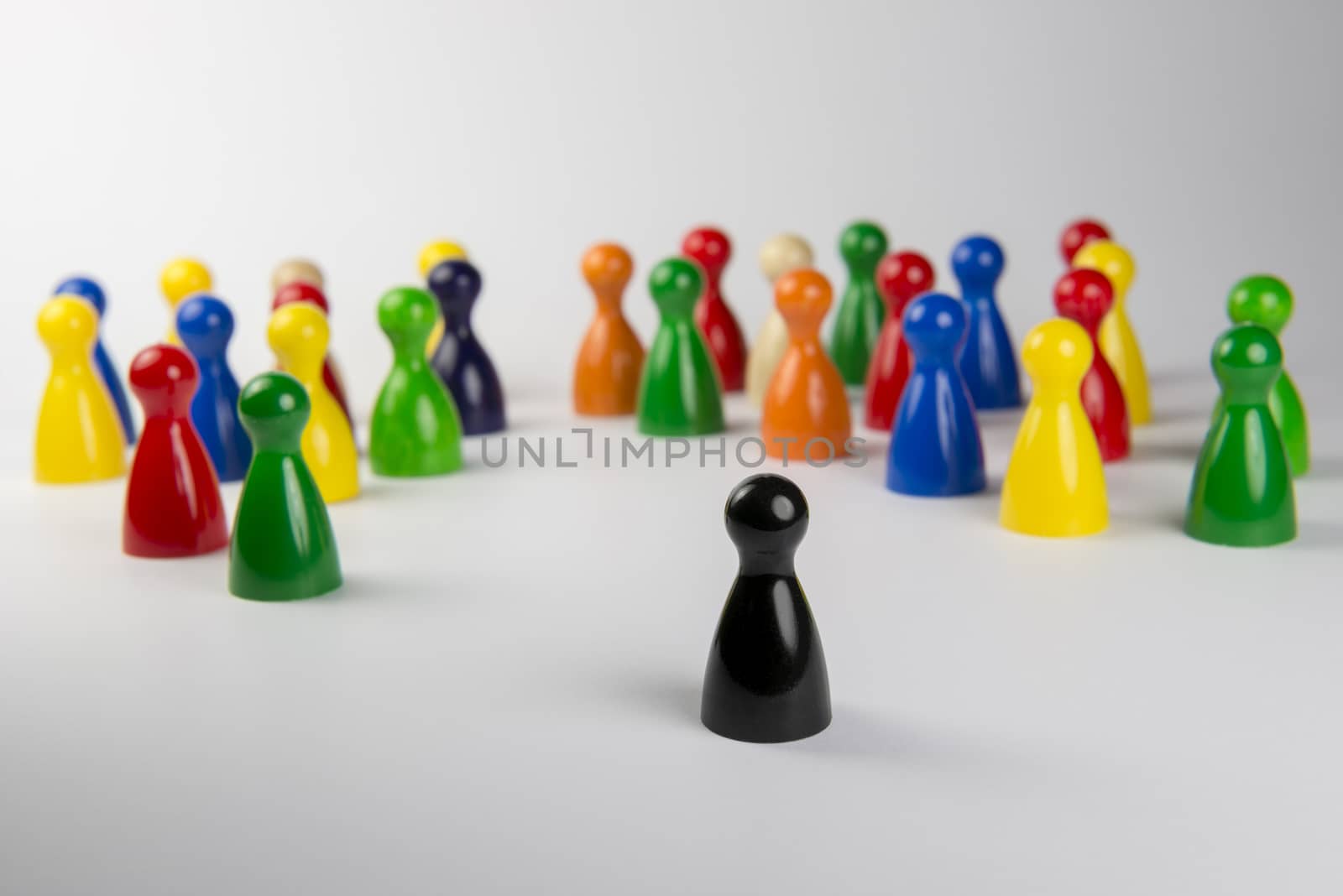 Conceptual game pawns that depict the concept different
