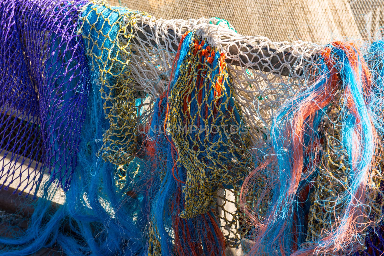Colored fishing nets in a Dutch fishing port
