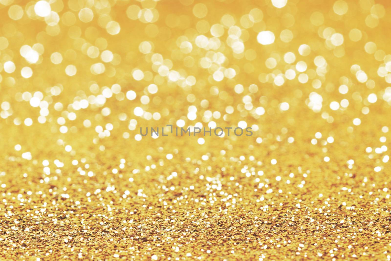 Abstract glitter bokeh holiday golden background