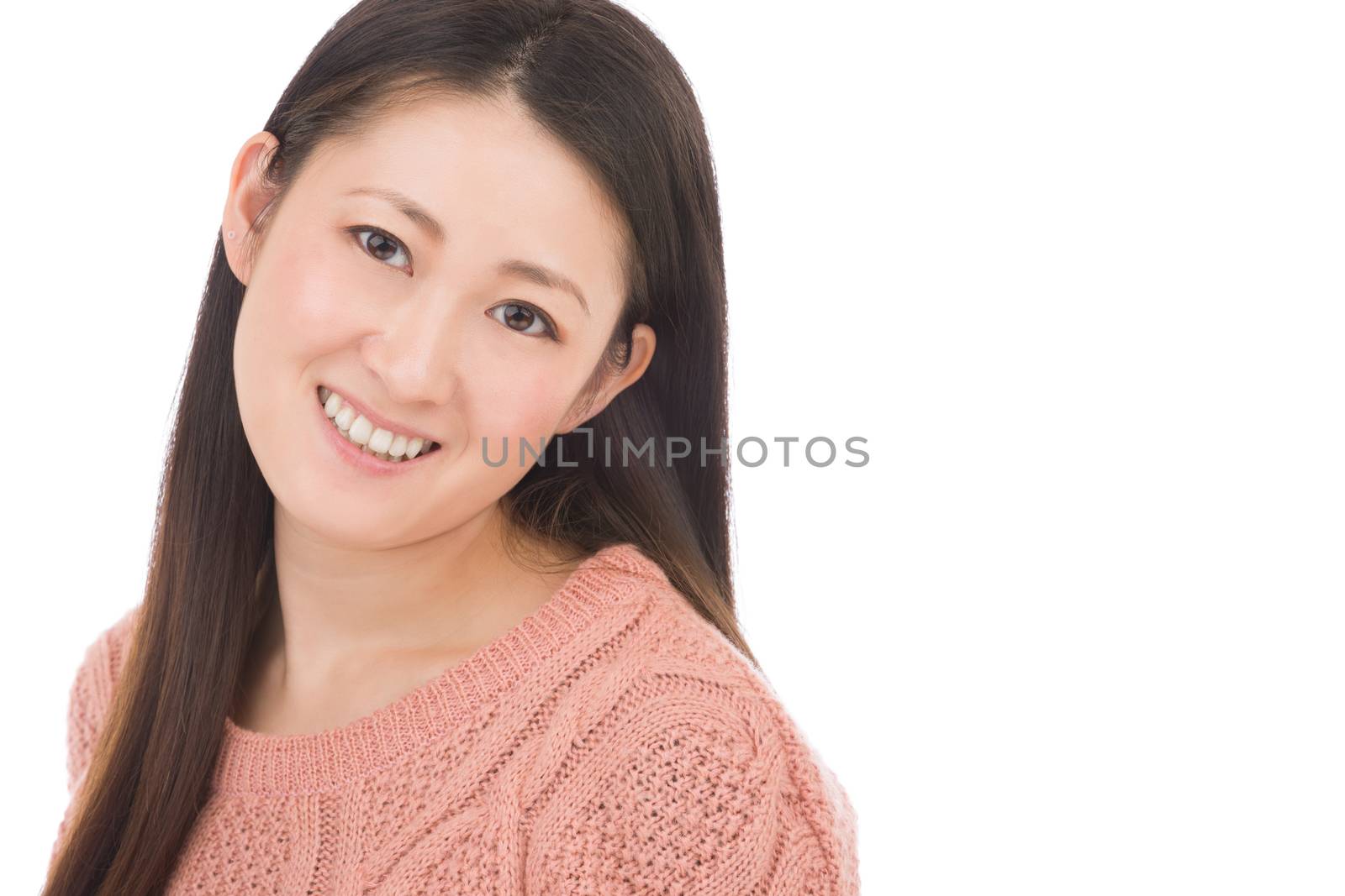 A headshot of a Japanese woman in hear early 30s on a simple white background.