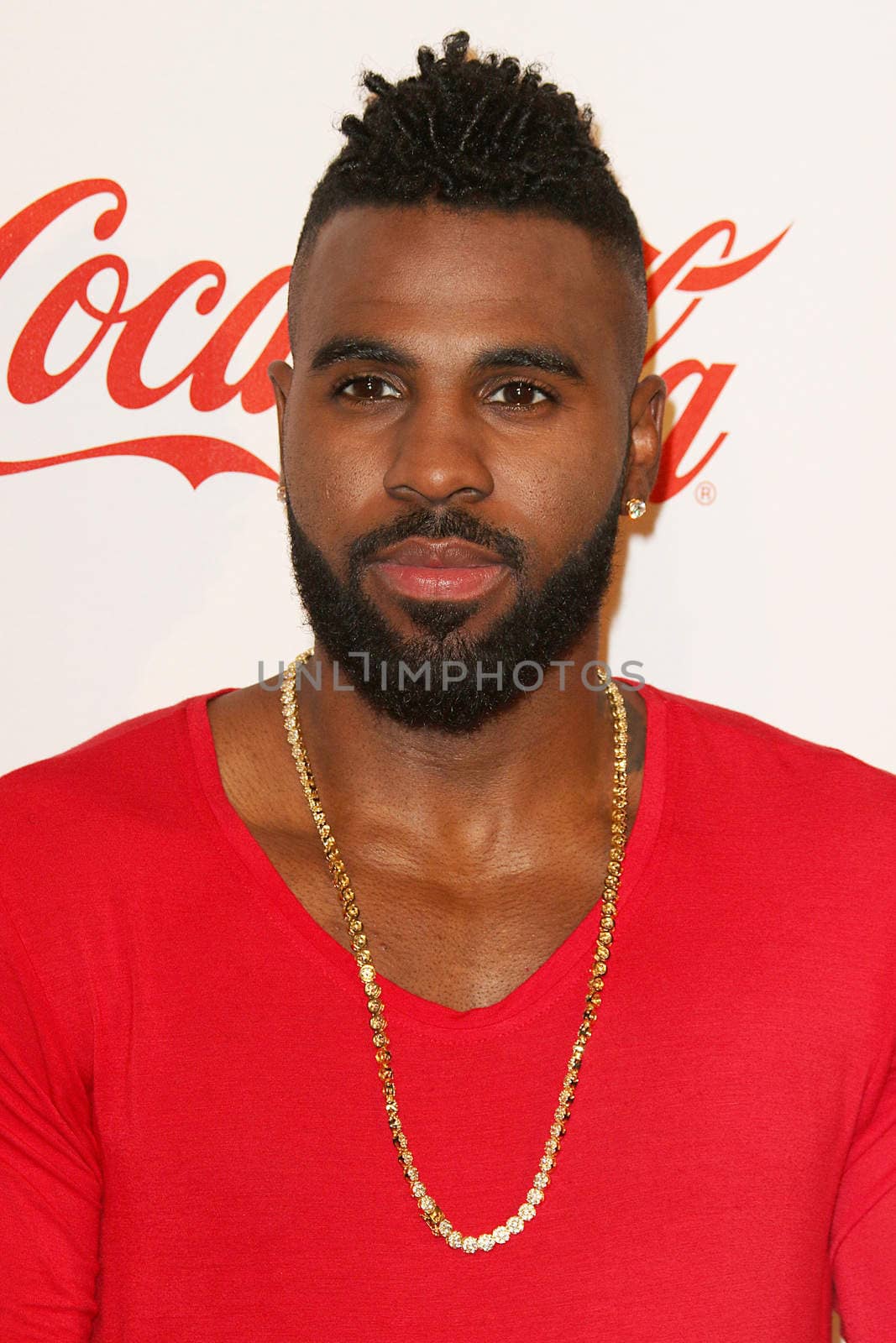 UNITED KINGDOM, London: Jason arrives to the O2 stadium ahead of Capital's Jingle Bell Ball on December 5, 2015.  The event shares a portion of the ticket sales profit with Global's Make Some Noise charity.  Stars in the photos include: David Guetta, F leur East, Jason Derulo,  Katy B, Marvin Humes, Nathan Sykes, Tinie Tempah, WSTRN, and Years and Years.      