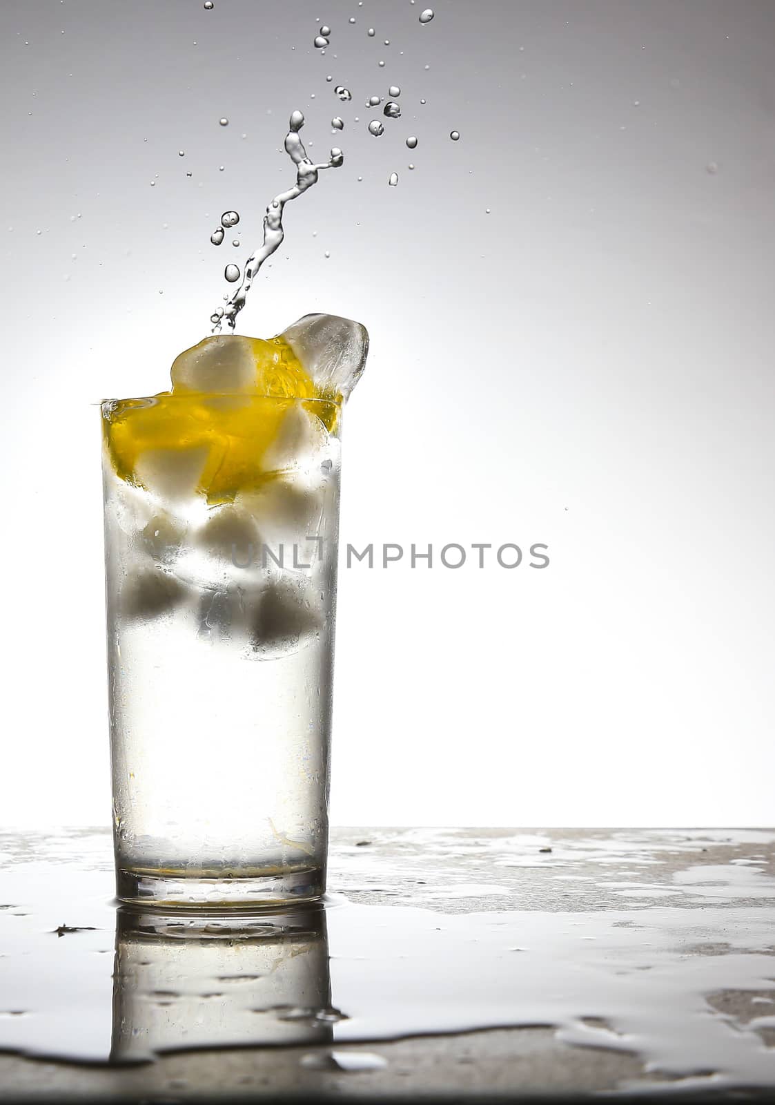 Lemon Juice and ice cubes by chuckyq1