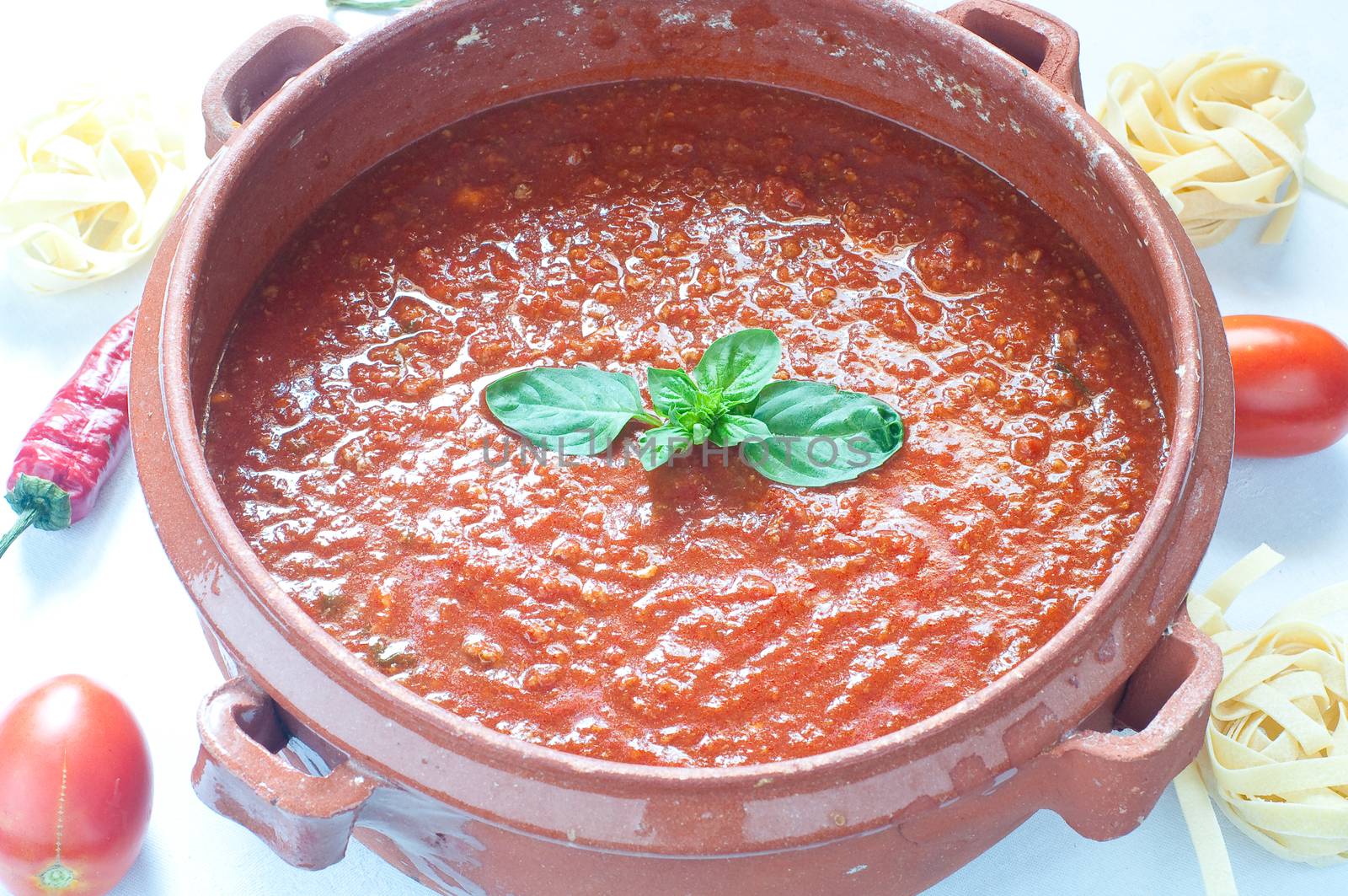Tomato sauce in a clay pot, italy