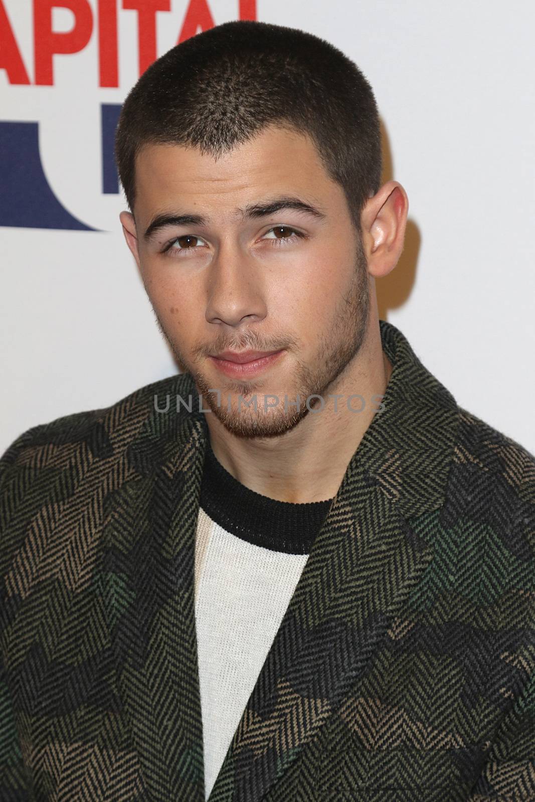 UNITED KINGDOM, London: Nick Jonas attends the Capital FM Jingle Bell Ball at 02 Arena in London on December 6, 2015. 