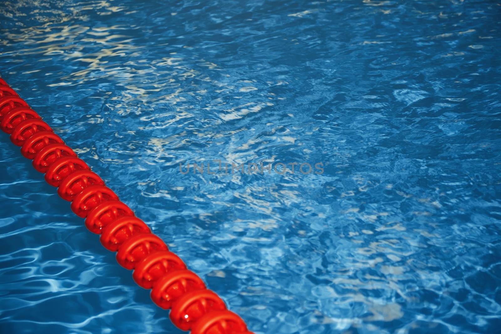 Swimming pool with lane markers. Horizontal photo