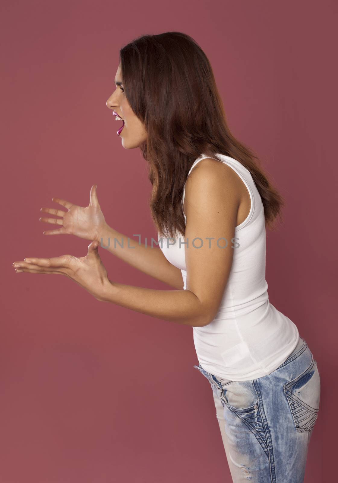 Beautiful model over pink background.