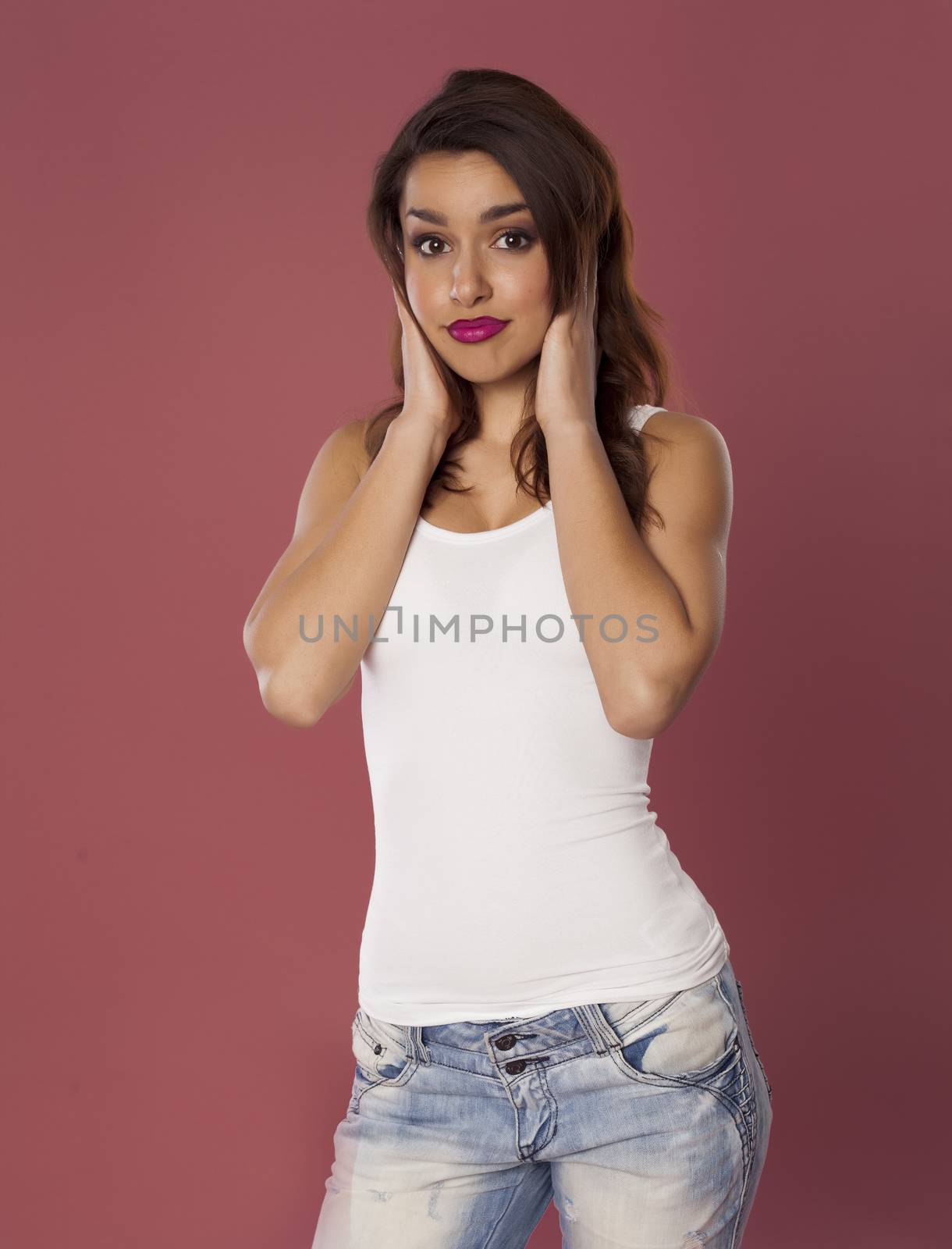 Beautiful model over pink background.