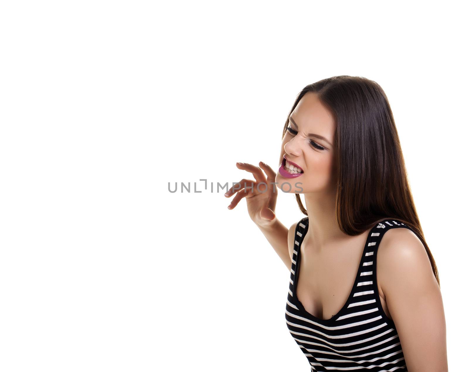 Woman shouting in anger over a white background.