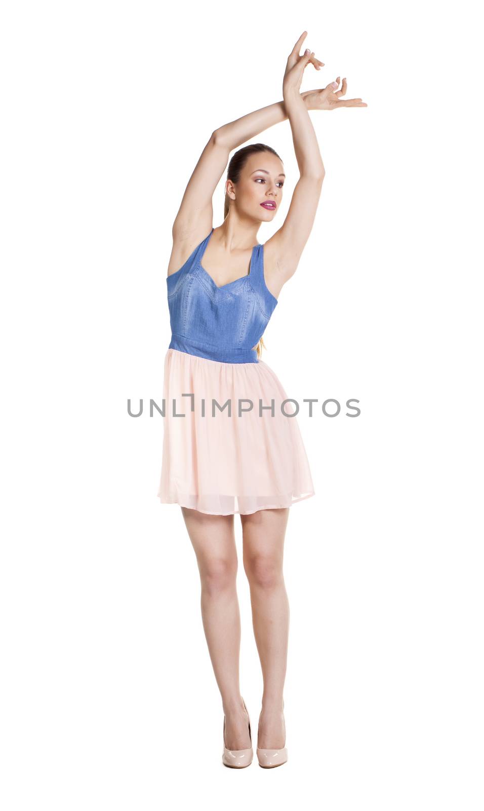 Casual young woman over a white background.