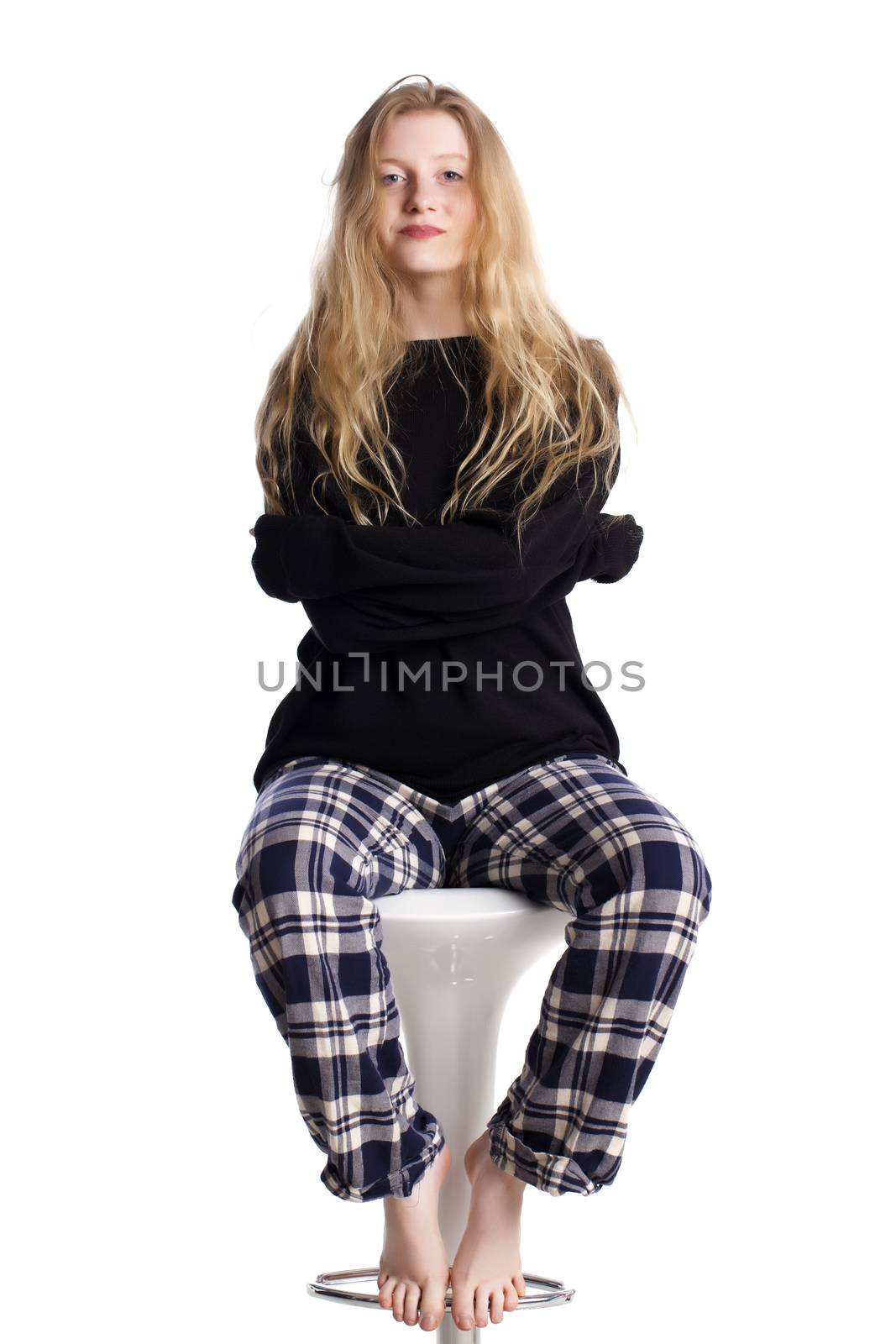 Fashionable blond woman over a white background.