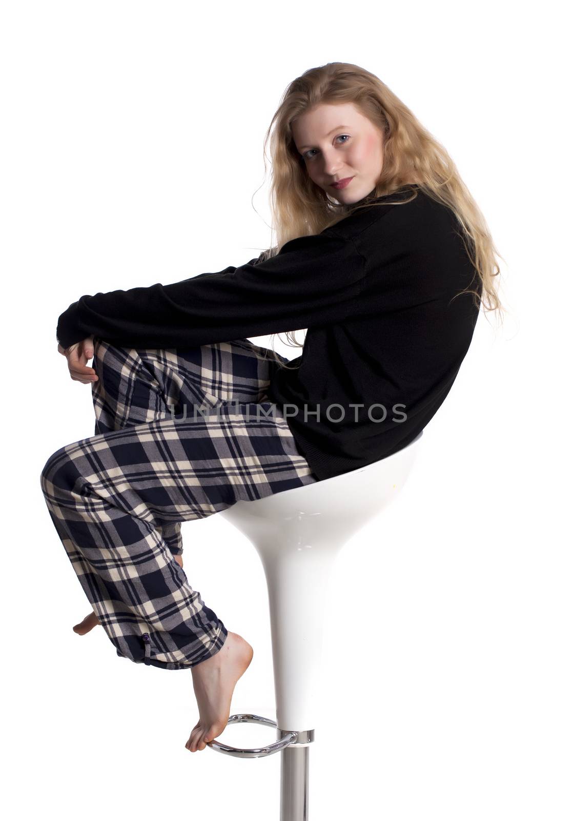 Fashionable blond woman over a white background.