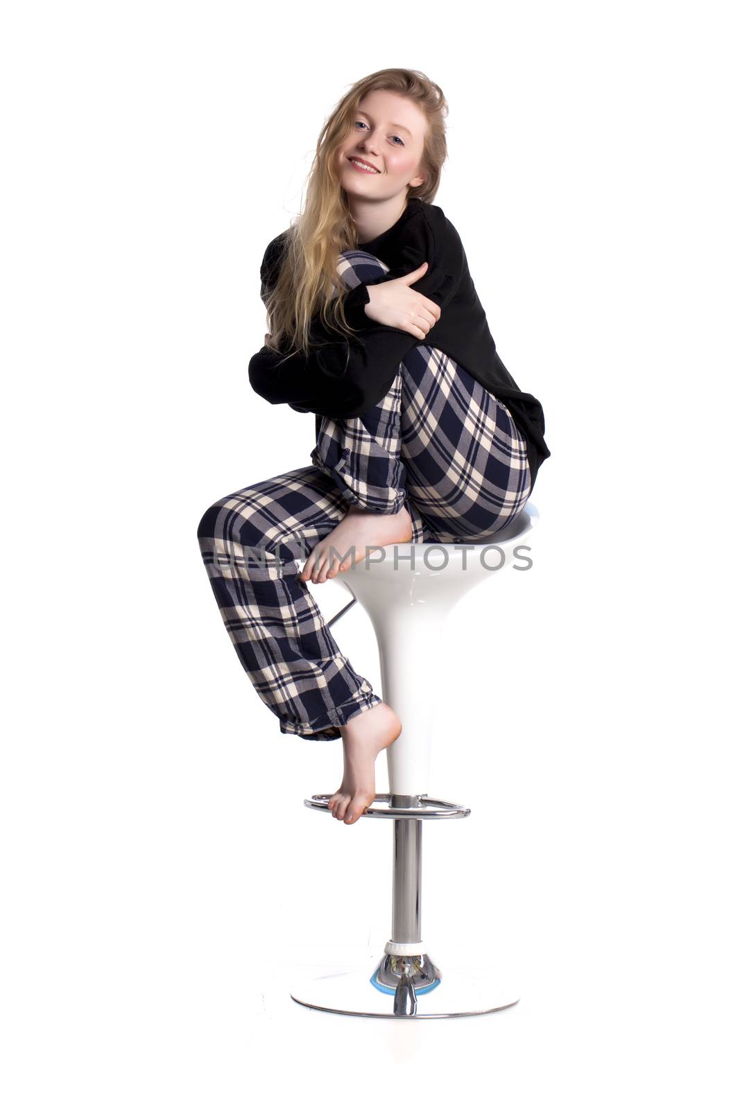 Fashionable blond woman over a white background.