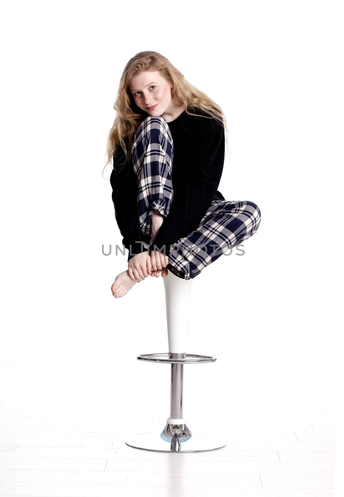 Fashionable blond woman over a white background.