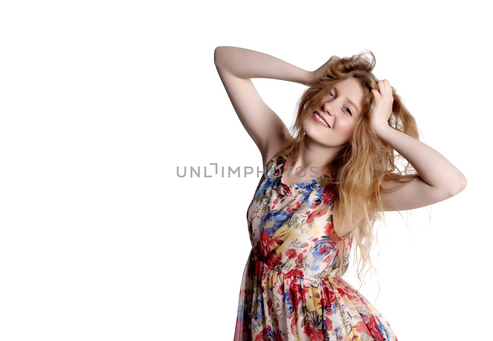 Fashionable blond woman over a white background.