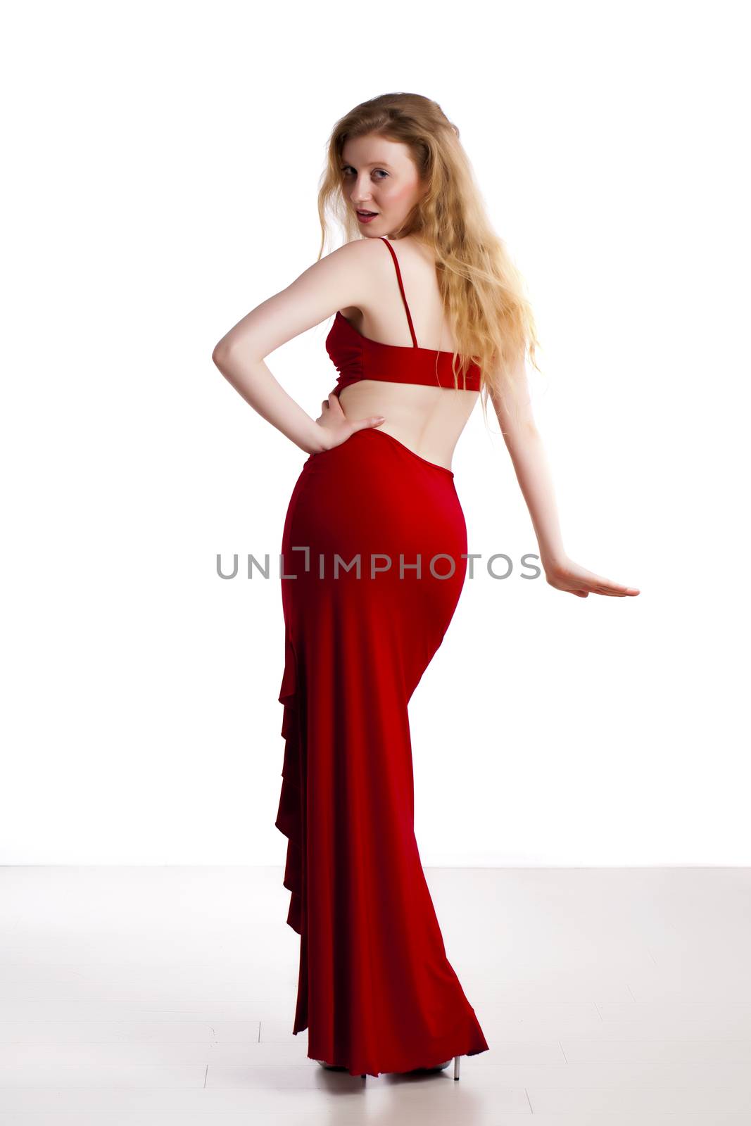 Fashionable blond woman over a white background.