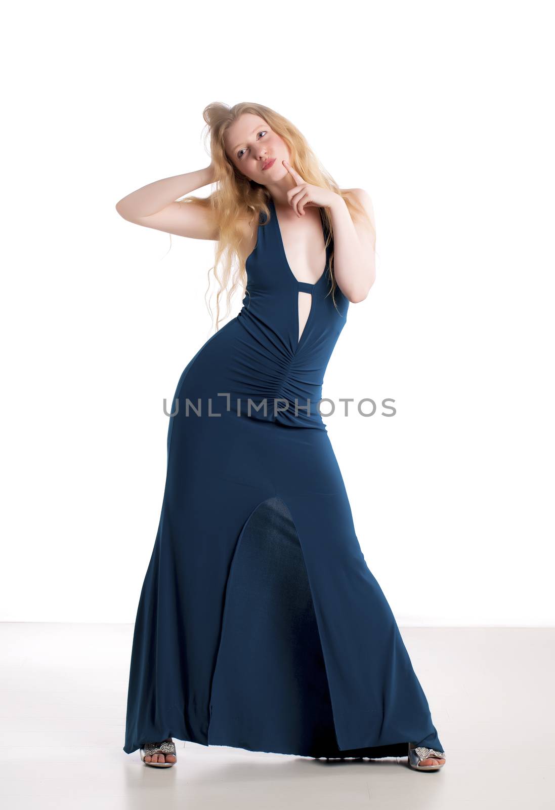 Fashionable blond woman over a white background.