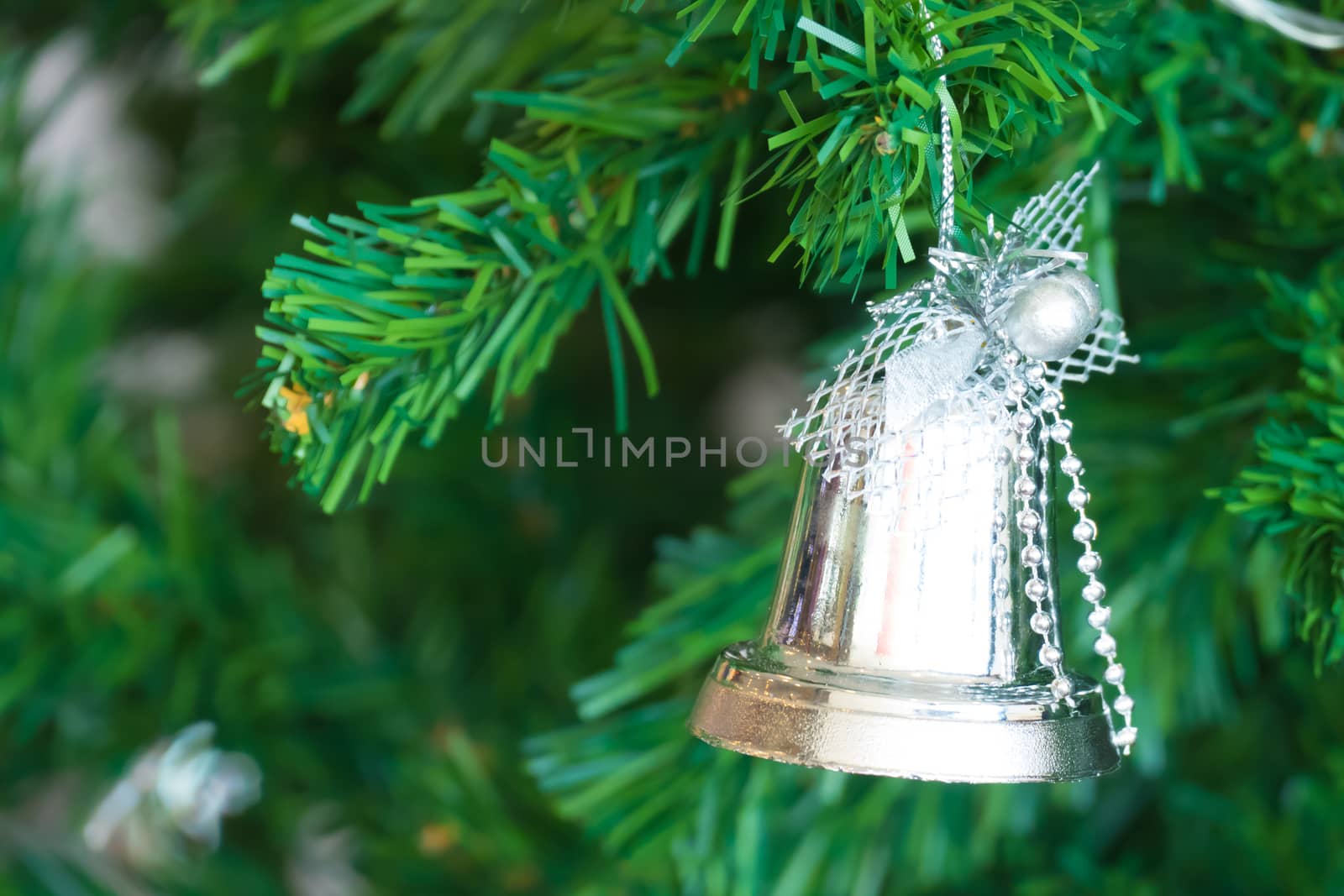 Gold Christmas background of de-focused lights with decorated tree, Christmas background 