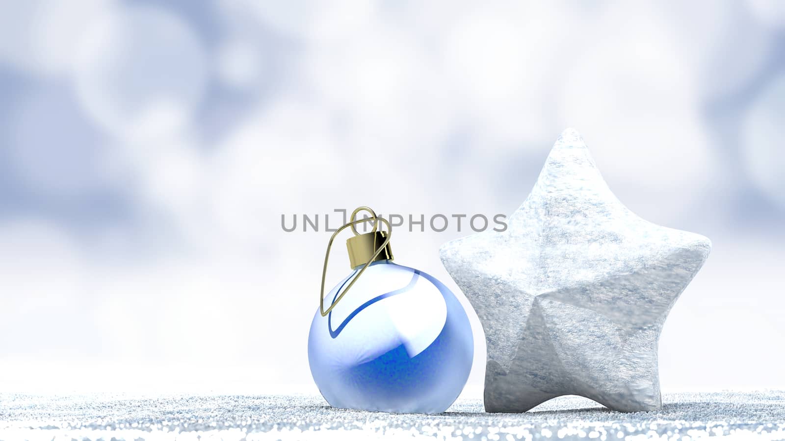 Christmas ornament ball and star on a fresh snow
