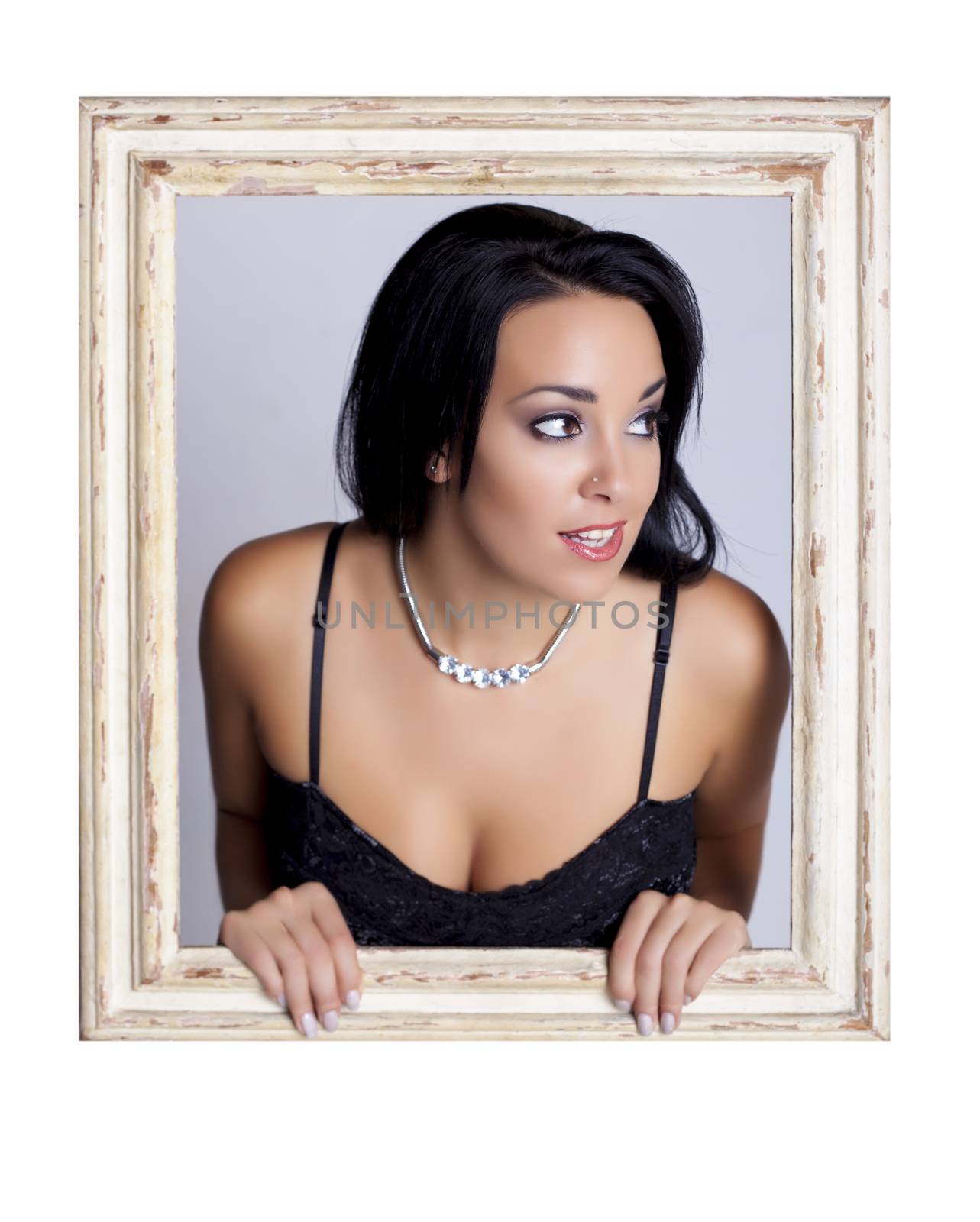 Abstract image of a beautiful woman trapped in a picture frame.
