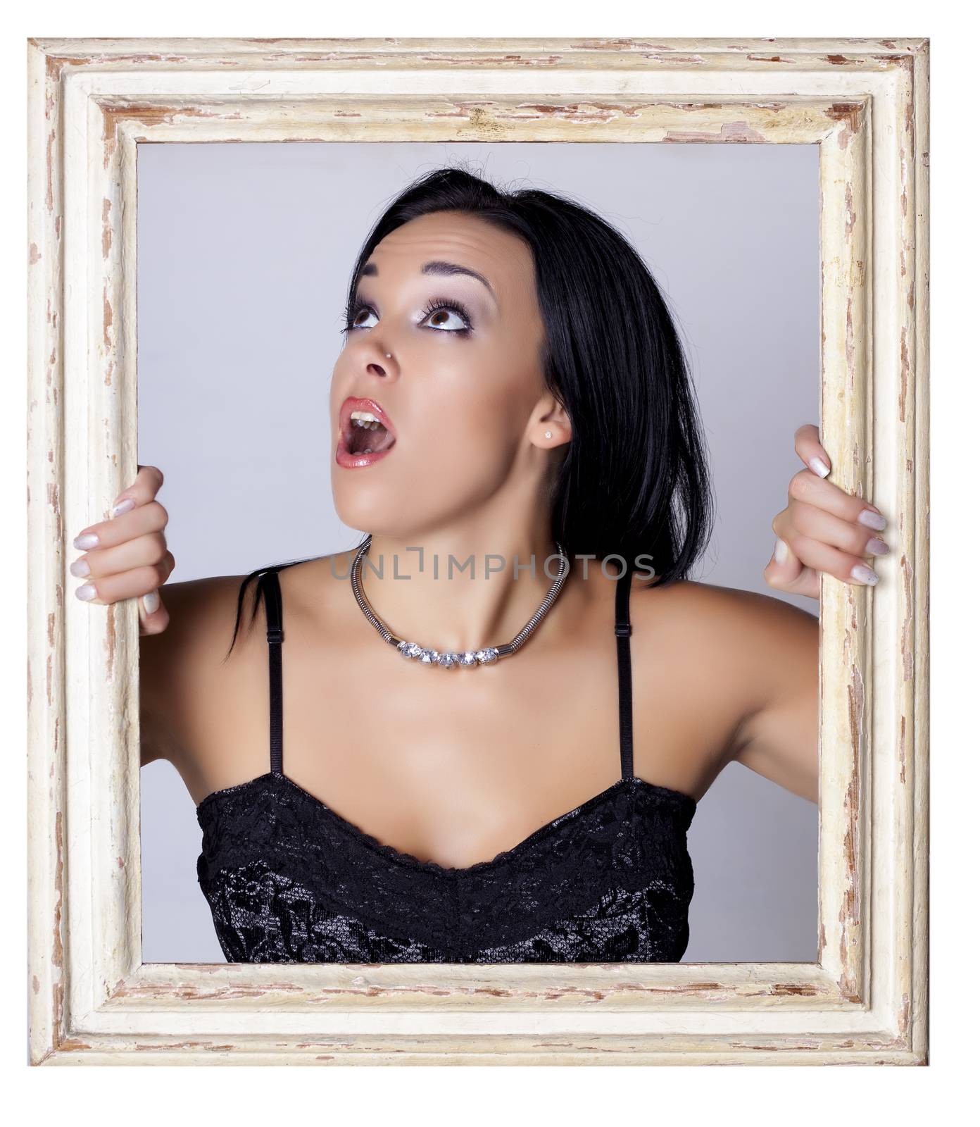 Abstract image of a beautiful woman trapped in a picture frame.