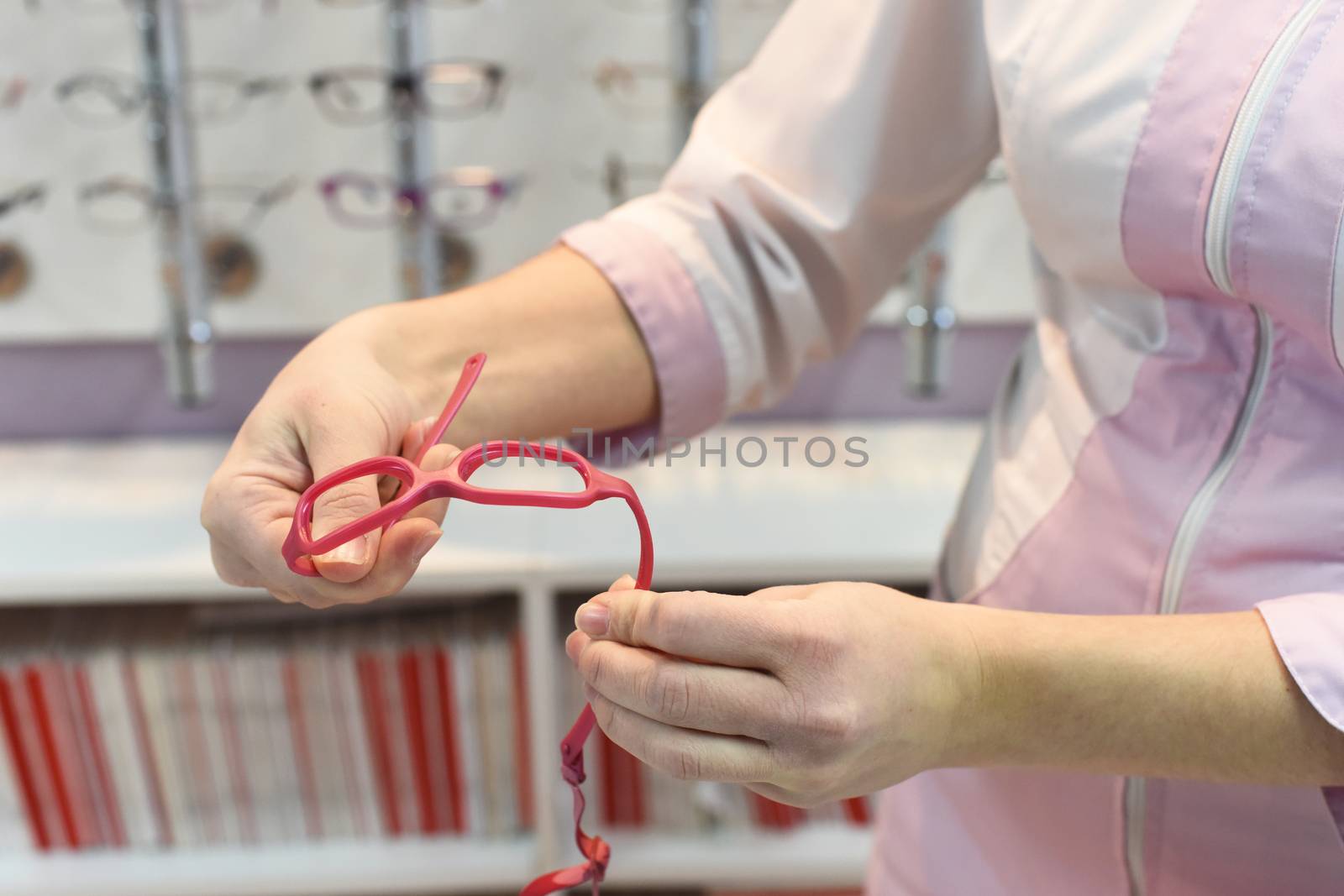 Choice of glasses by ophthalmologist,, closeup photo