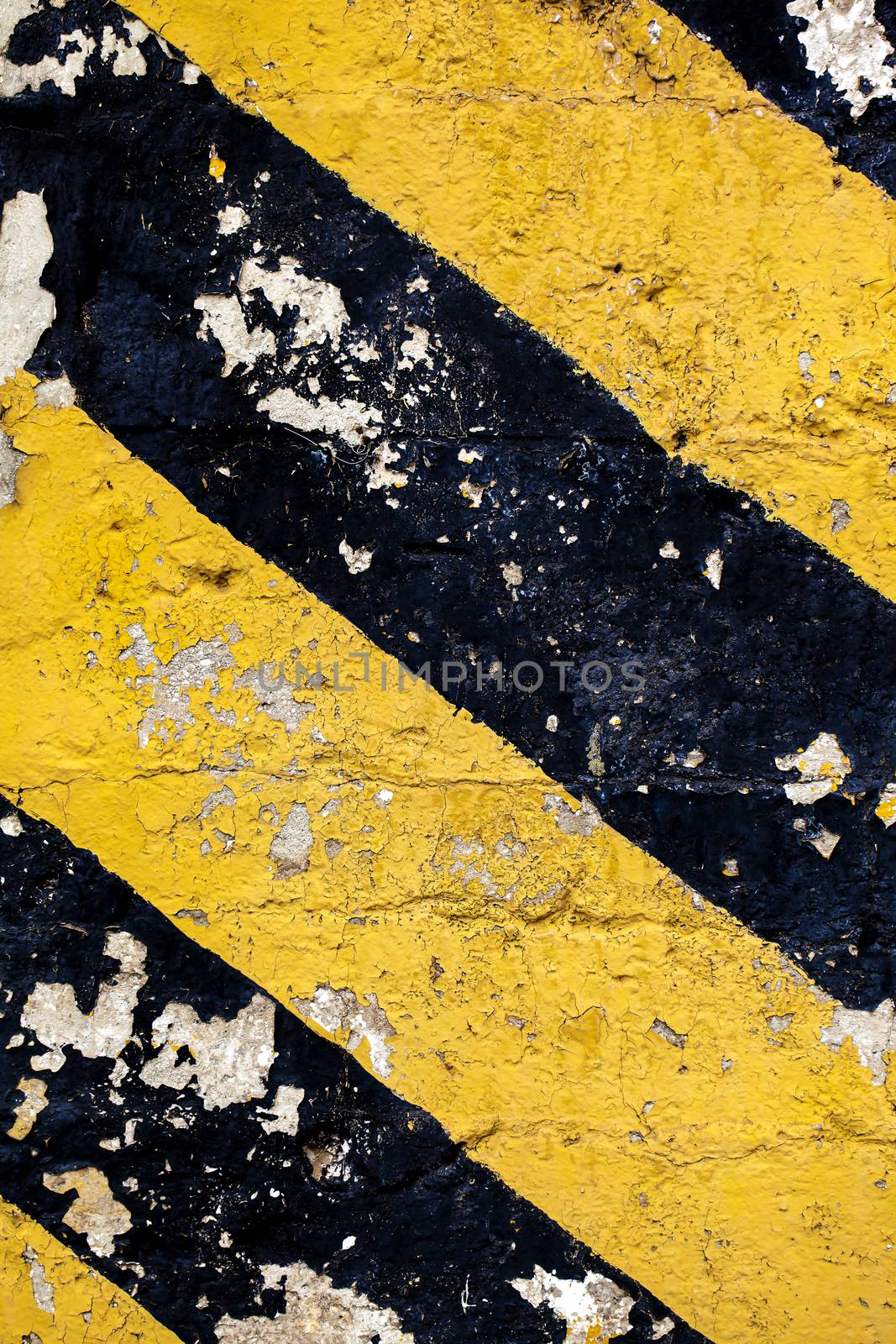 Dirty grunge image of a dirty chevron in black and yellow.