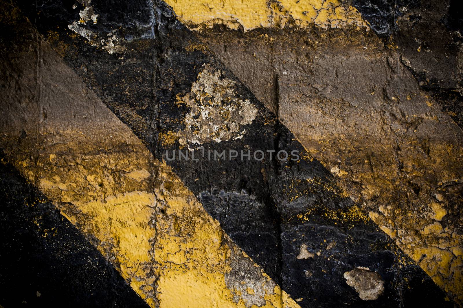 Dirty grunge image of a dirty chevron in black and yellow.