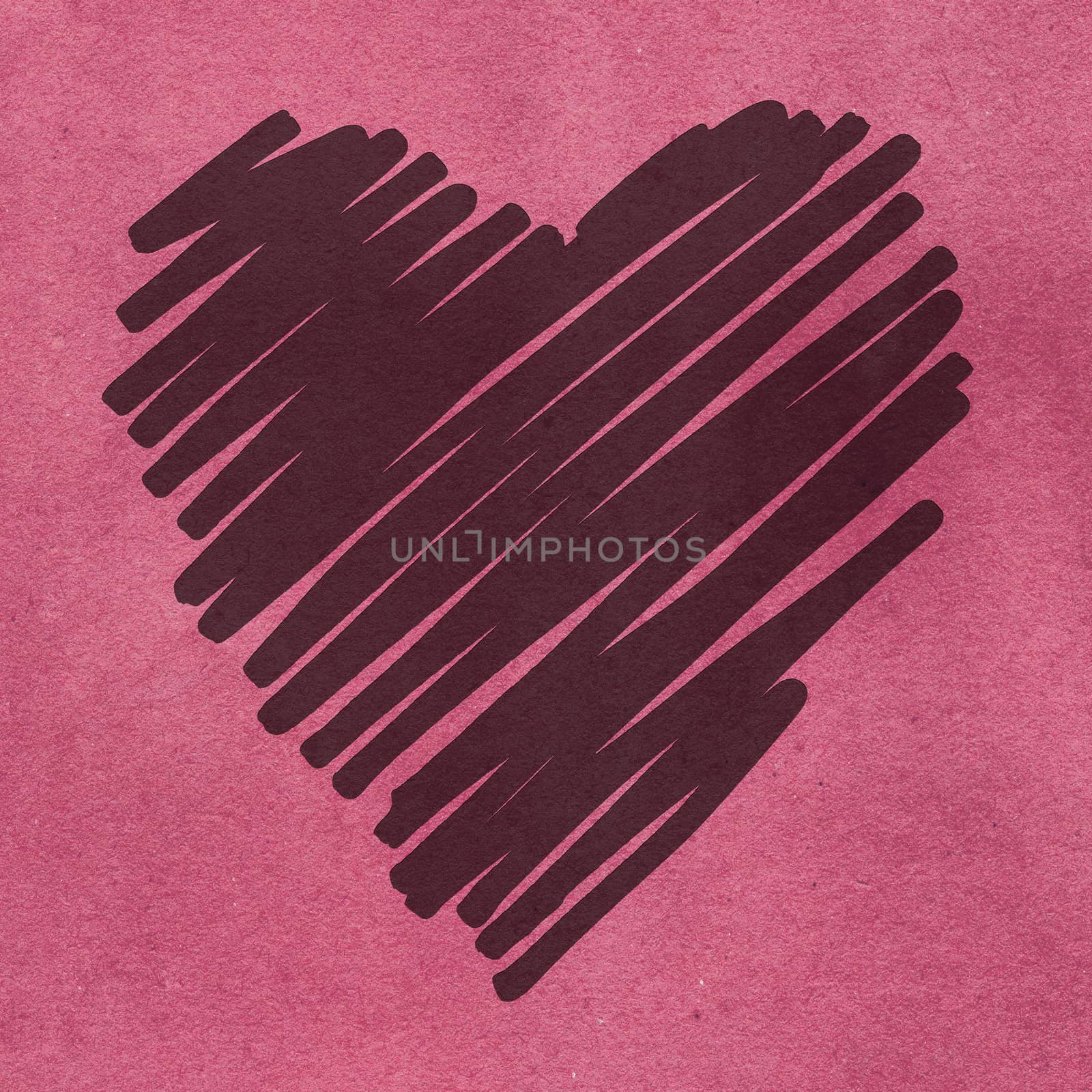 Bas relief of heart doodle on pink grained background