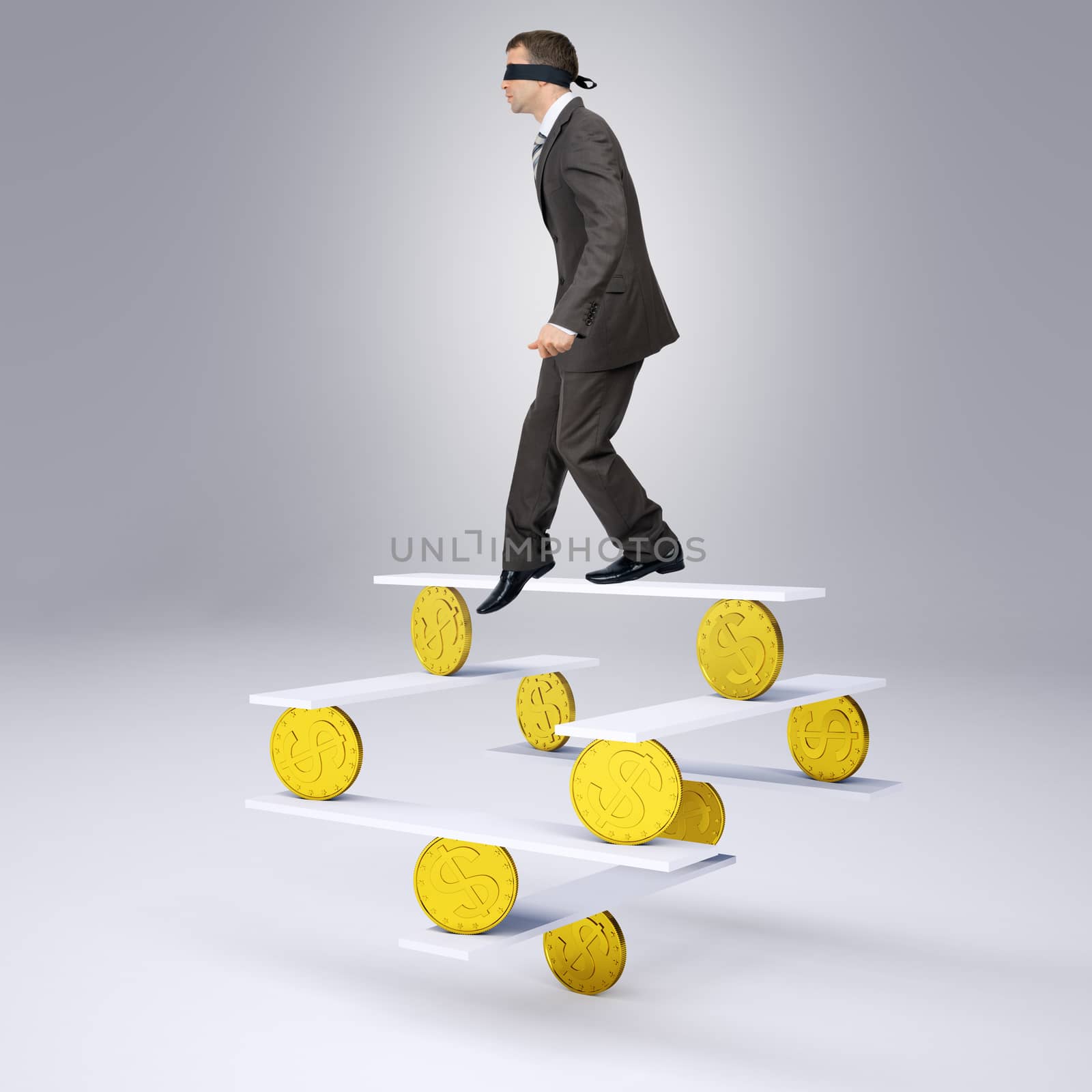 Man with band on his eyes standing on balance with coins