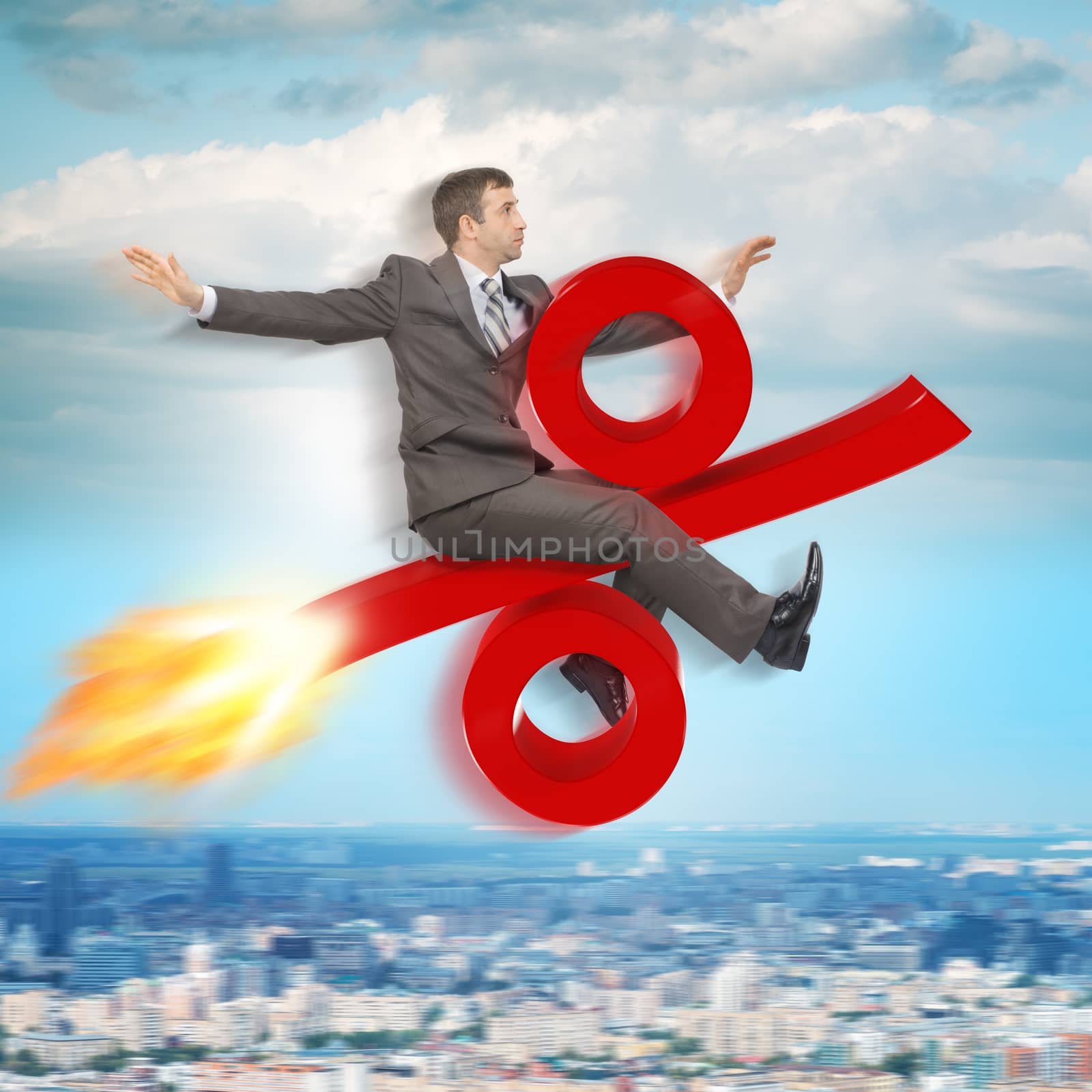 Businessman flying on percent sign by cherezoff