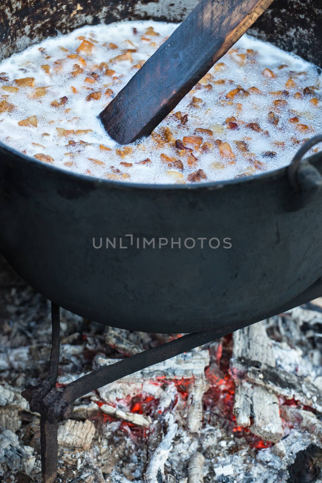 Traditional lard cooking in cold season