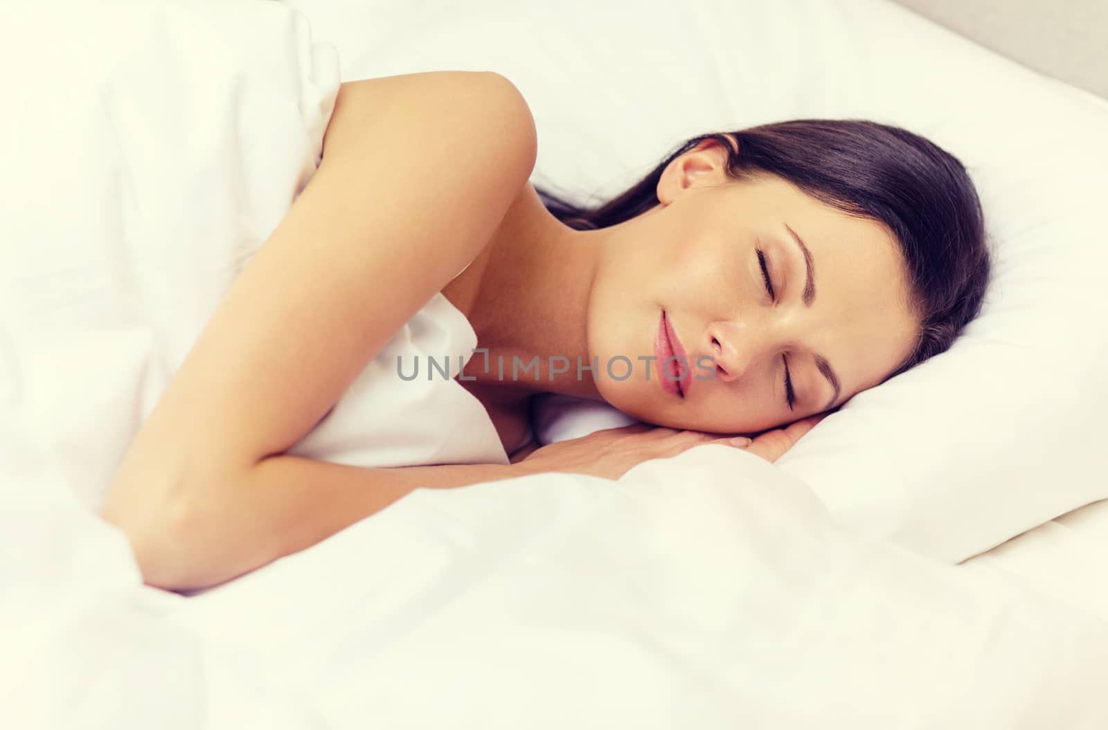 beautiful woman sleeping in bed by dolgachov