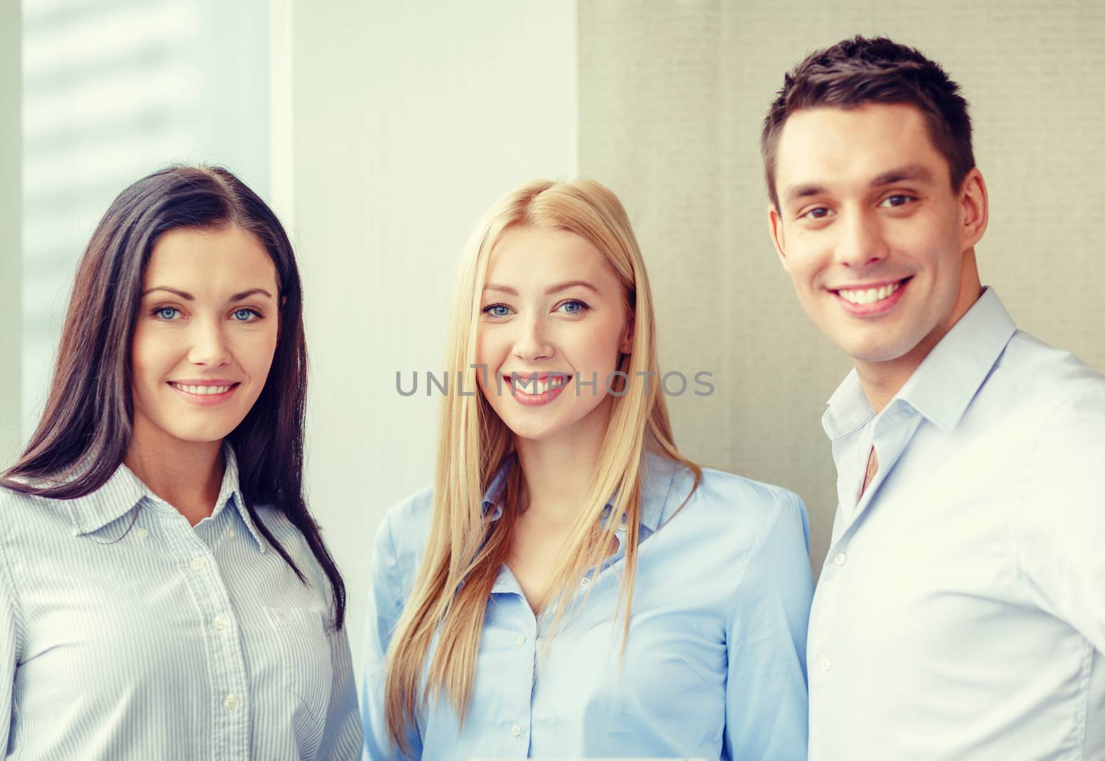 business and office concept - happy business team in office