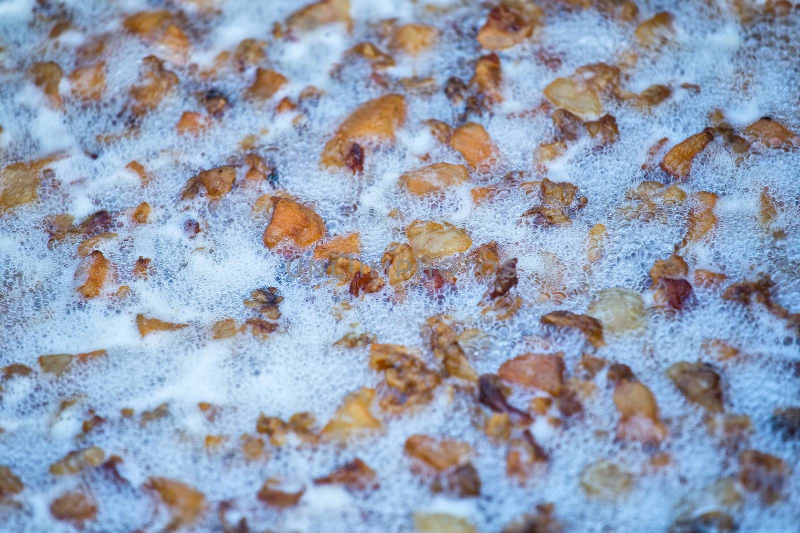 Traditional lard cooking in cold season