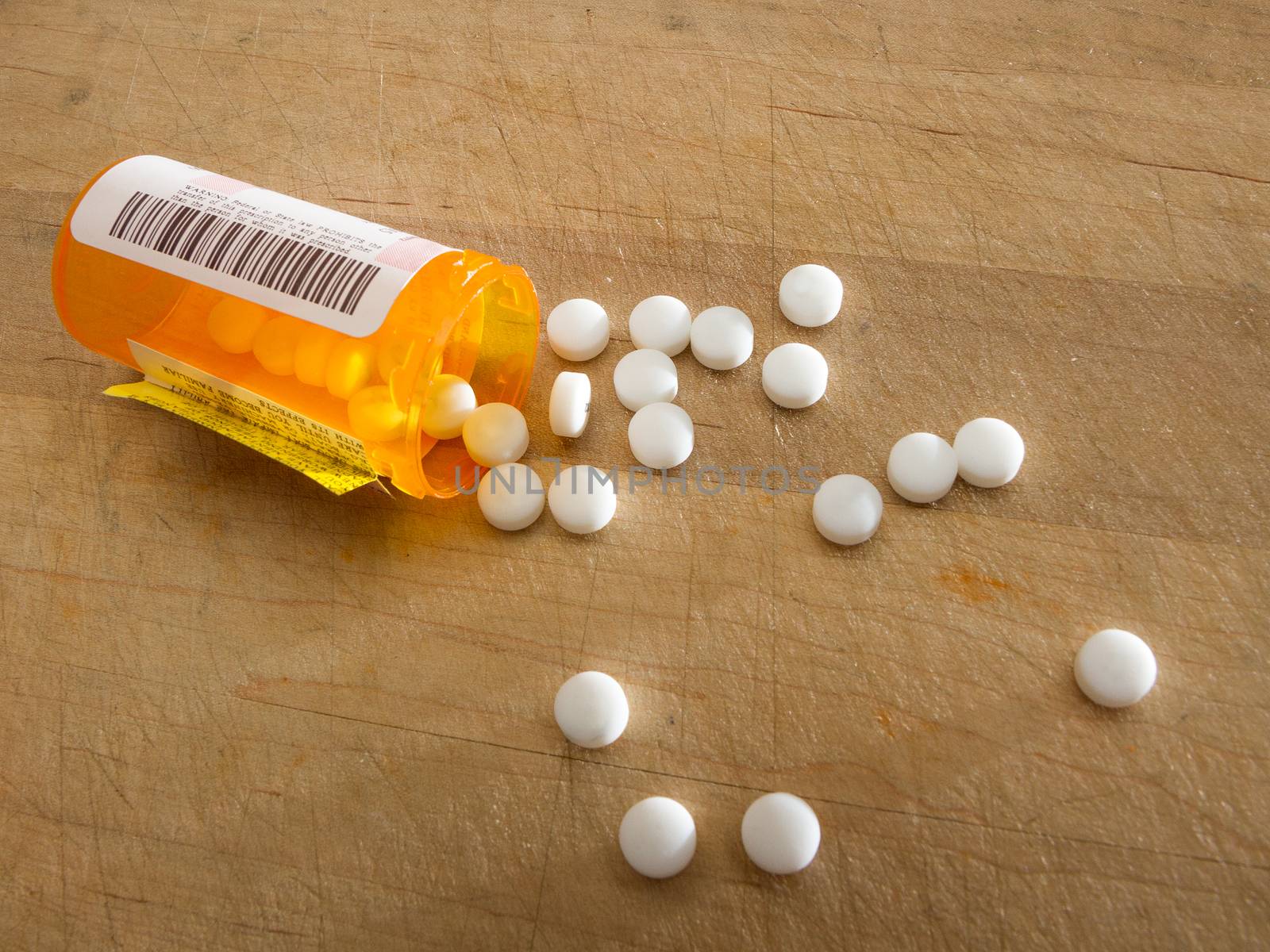 Medicine dumped over in a bottle