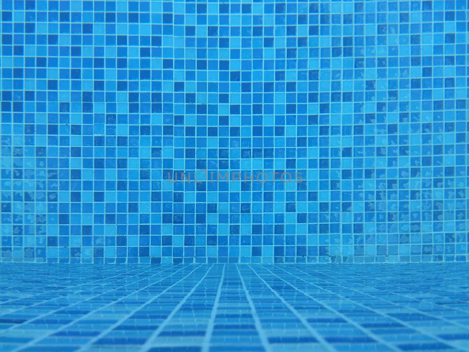 Mosaic tiles blue pattern of swimming pool