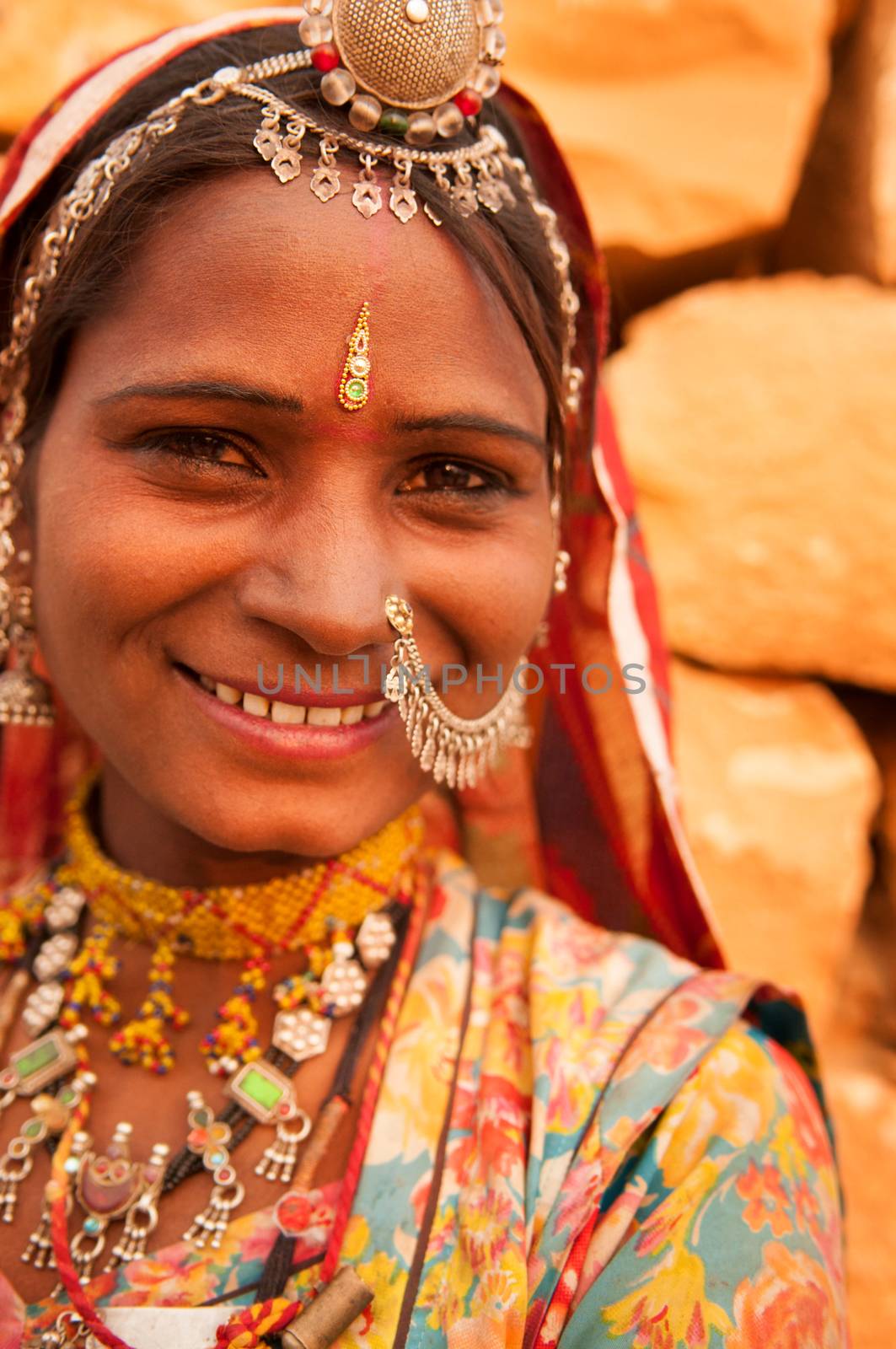 Portrait of smiling traditional Indian woman in sari dress, India people