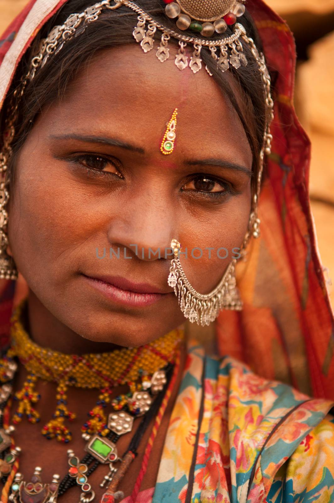 Close up portrait of traditional Indian woman in sari dress, India people.