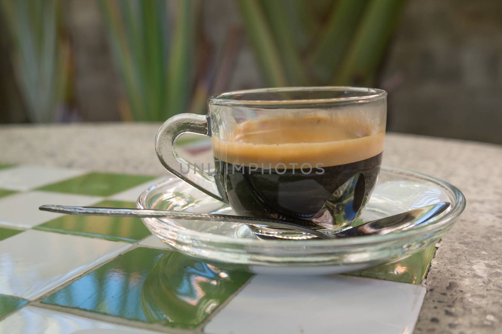 Coffee cup and saucer on table background. by nikky1972