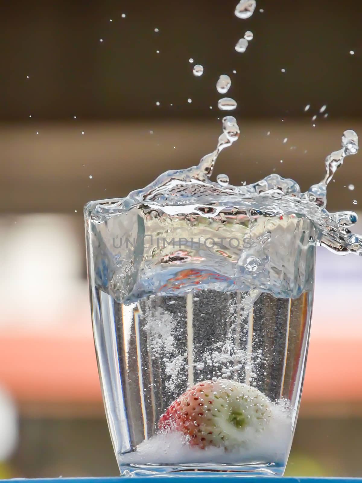 Strawberry Water splash in glass