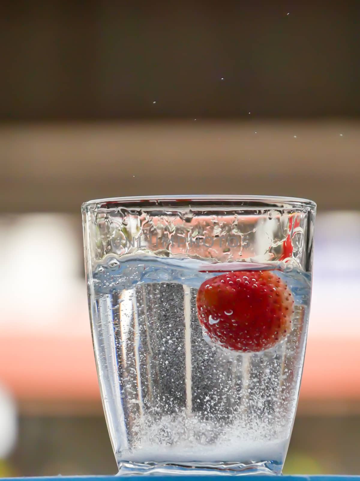 Strawberry Water splash in glass