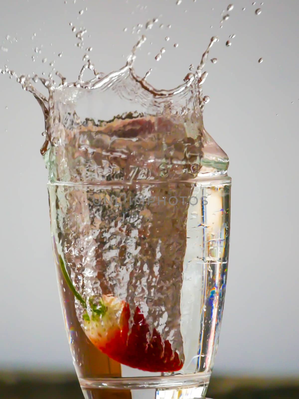 Strawberry Water splash in glass