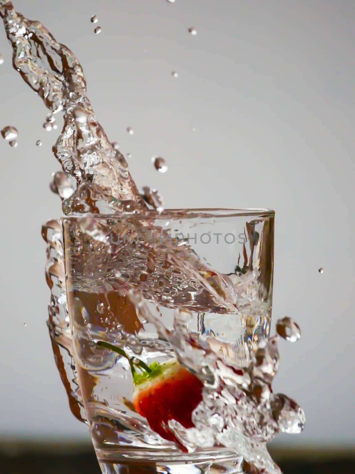 Strawberry Water splash in glass