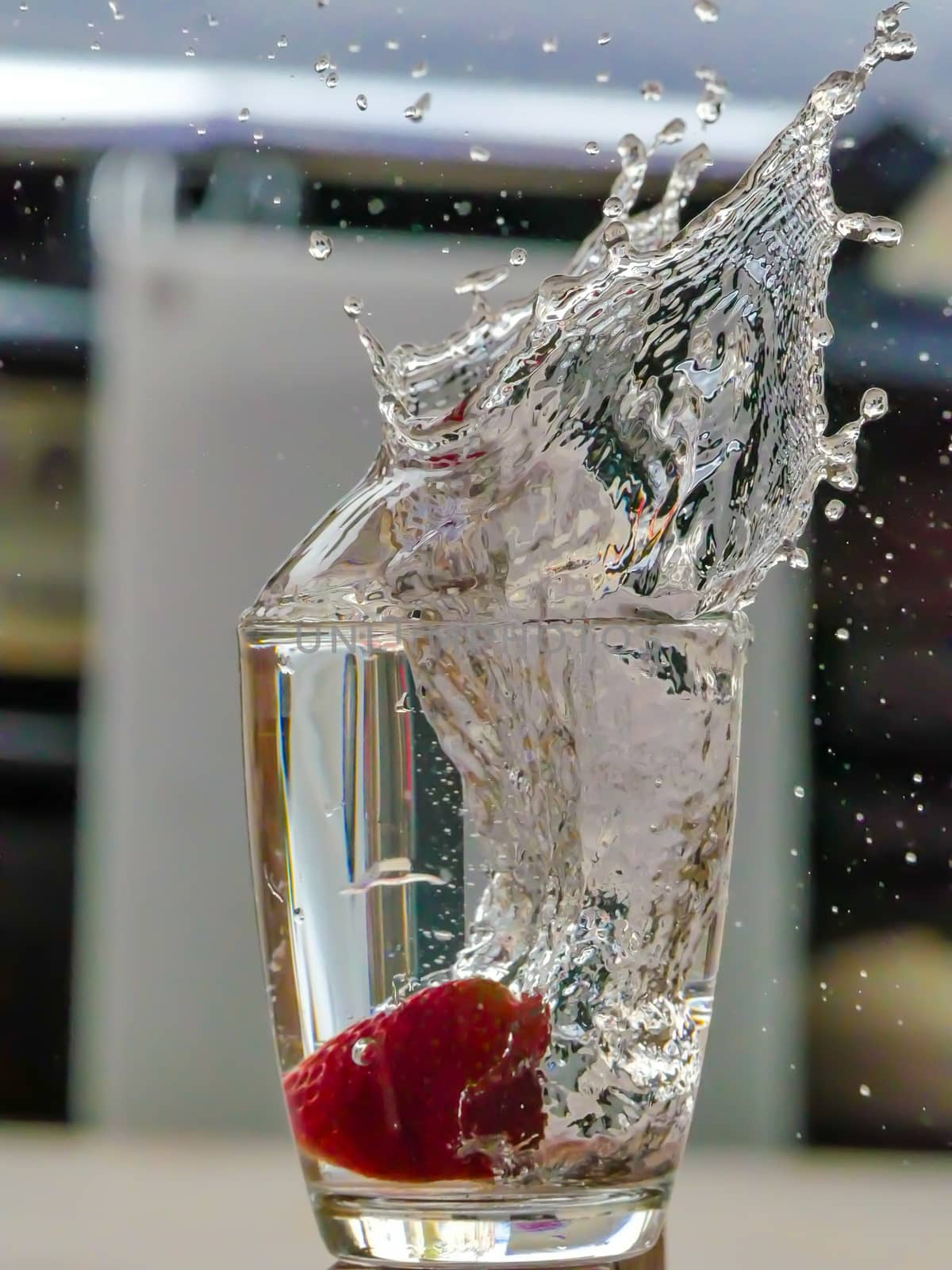 Strawberry Water splash in glass