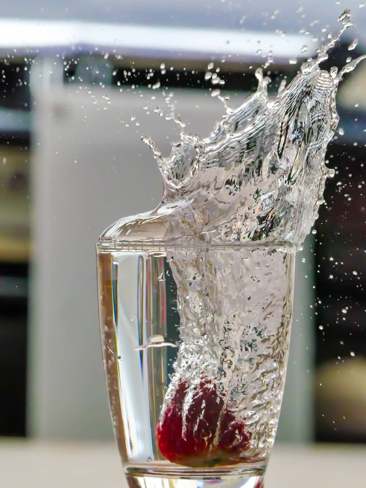 Strawberry Water splash in glass