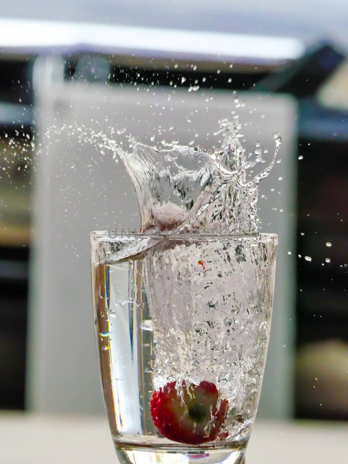 Strawberry Water splash in glass