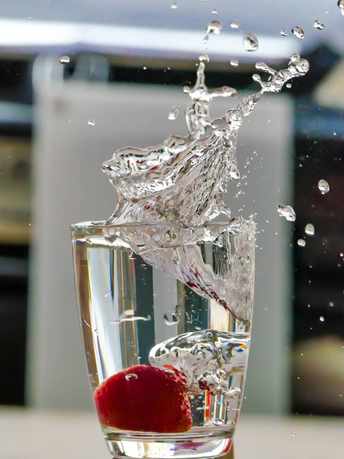 Strawberry Water splash in glass