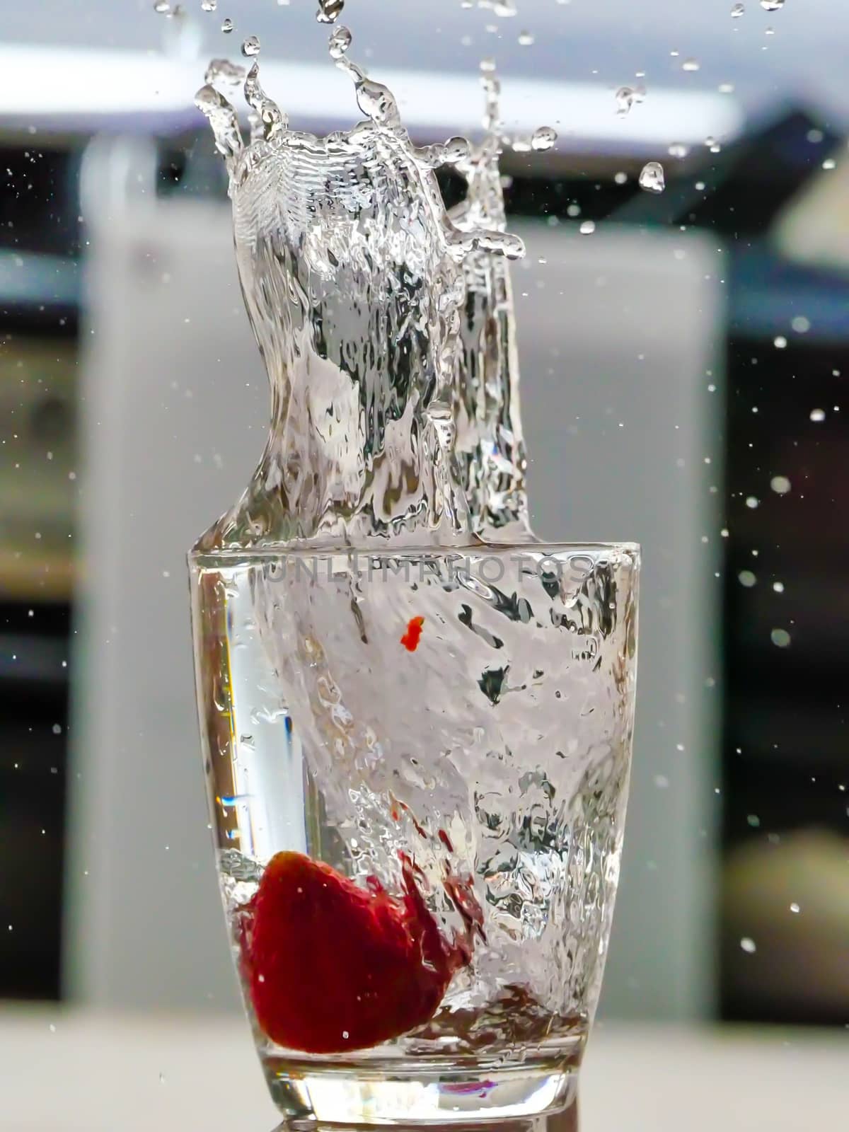 Strawberry Water splash in glass